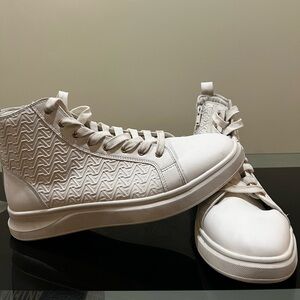 White sneakers from Aldo. Great condition and lightly worn.